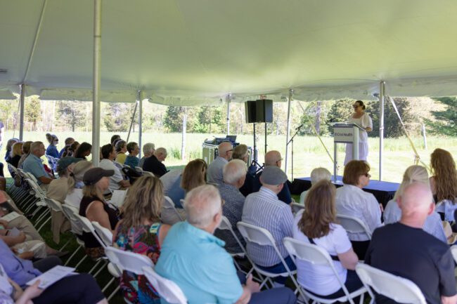 Speaking program during Emilson Family Wall of Remembrance event