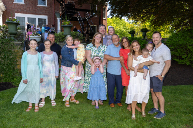 Family in lower garden of Pat Roche Hospice Home
