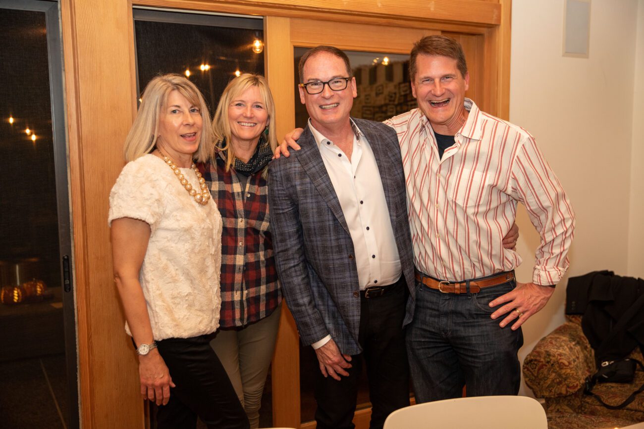 Group of four people at a party