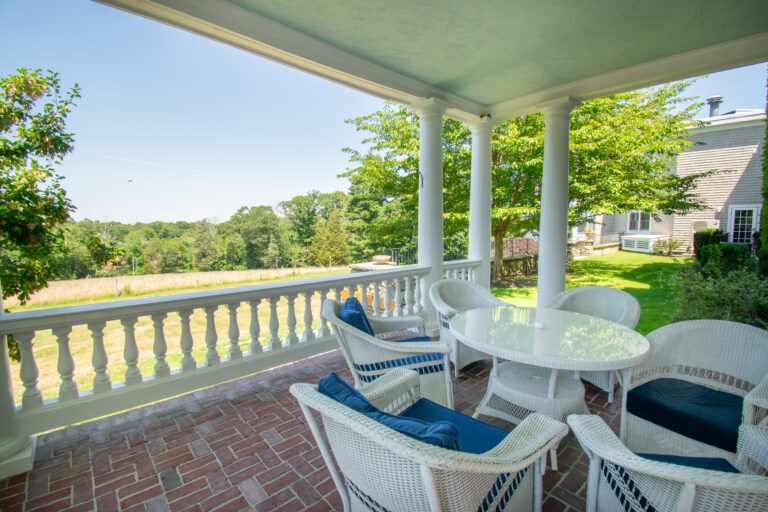 Covered back patio overlooking hospice home grounds