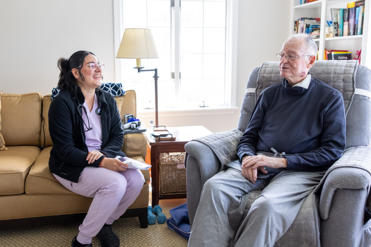 Nurse laughing with patient
